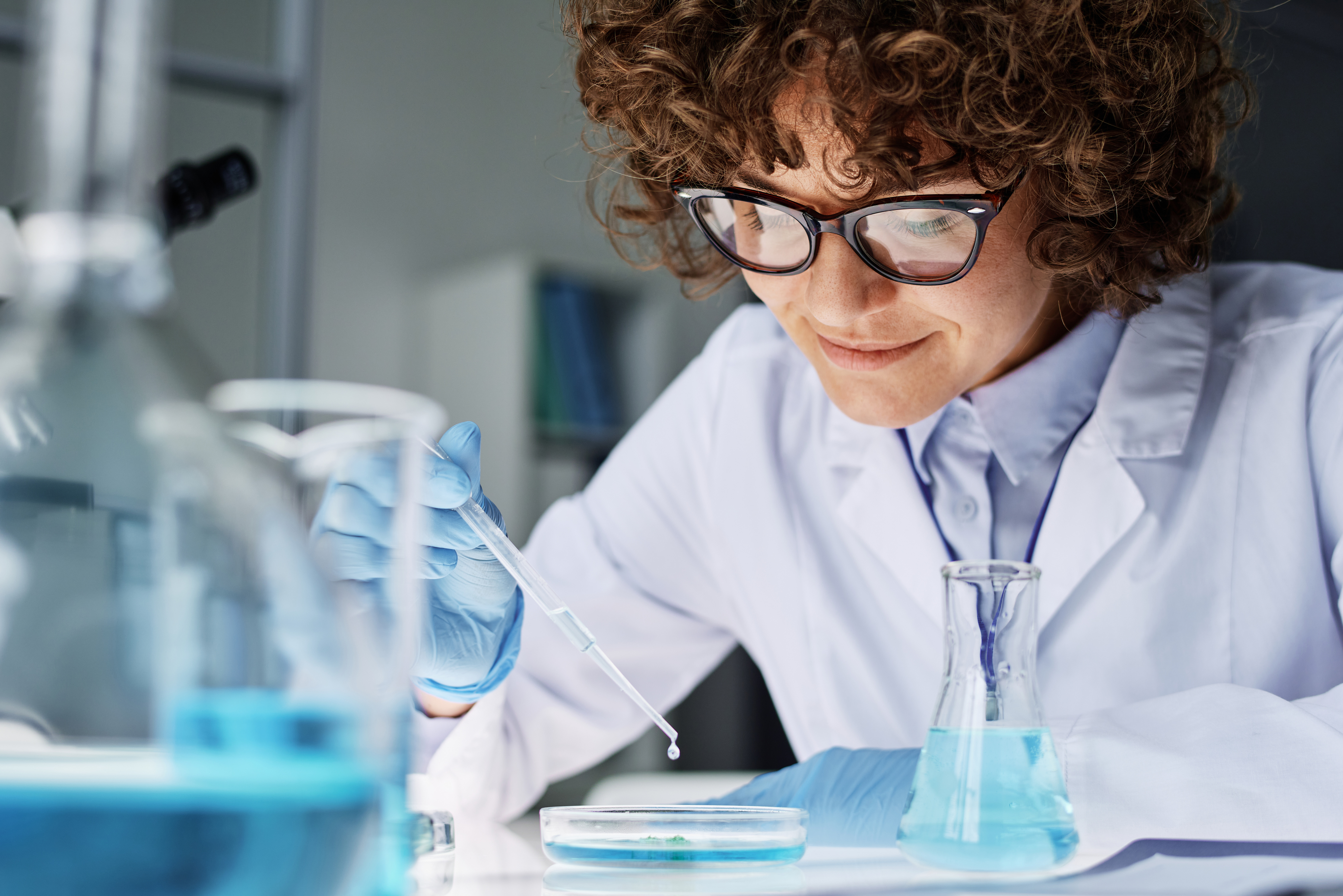 Woman at microscope