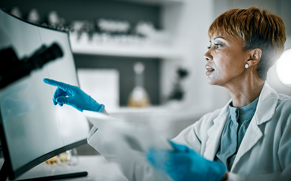 Female surgeon reviewing information